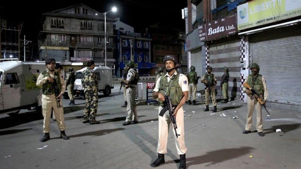 Indian soldiers stand guard in Srinagar