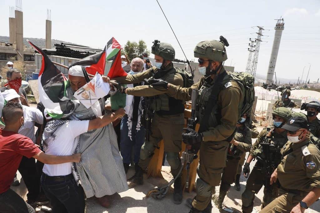 Palestinians protesting against the agreement between the United Arab Emirates and Israel
